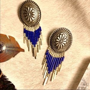 Sterling silver and lapis conch earrings